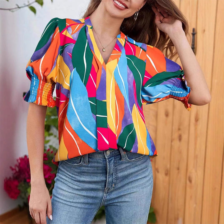Chalia - Blouse with floral pattern and puff sleeves